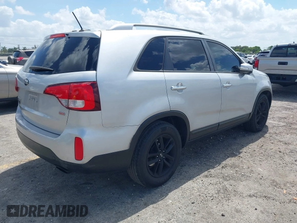 2014 Kia Sorento LX z VIN 5XYKT4A76EG502421, wystawiony jako IAAI lot #42176516 z przebiegiem 192 354 mil mil oraz . Historia ofert i sprzedaży dostępna na DreamBid. Obrazek 4.