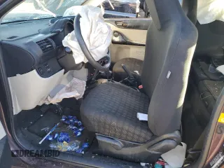 2014 Scion iQ z VIN JTNJJXB04EJ028369, wystawiony jako Copart lot #84030864 z przebiegiem Nie podano mil oraz Szkoda całkowita • Salvage title. Historia ofert i sprzedaży dostępna na DreamBid. Obrazek 7.
