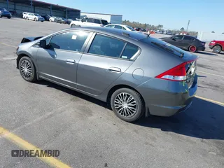2011 Honda Insight with VIN JHMZE2H3XBS005408, listed as a IAAI auction lot 41747390 with 154,892 mi miles and . Bid and sale history available at DreamBid. Image 3.