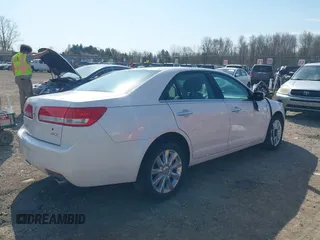 2012 Lincoln MKZ with VIN 3LNHL2GC1CR810128, listed as a IAAI auction lot 42114449 with 73,875 mi miles and . Bid and sale history available at carsss.com. Image 4.