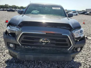2021 Toyota Tacoma SR5 z VIN 3TMAZ5CNXMM156385, wystawiony jako Copart lot #57384245 z przebiegiem 61 686 mil mil oraz Nie do naprawy • Non repairable. Historia ofert i sprzedaży dostępna na DreamBid. Obrazek 5.