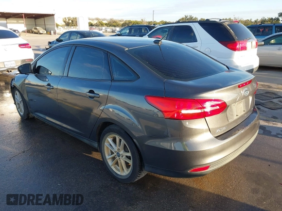 2017 Ford Focus SE with VIN 1FADP3F23HL342081, listed as a IAAI auction lot 41278282 with 88,572 mi miles. Bid and sale history available at carsss.com. Image 3.