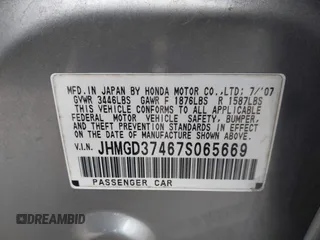 2007 Honda Fit with VIN JHMGD37467S065669, listed as a IAAI auction lot 42078795 with 124,030 mi miles. Bid and sale history available at carsss.com. Image 9.