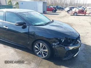 2019 Nissan Maxima SV with VIN 1N4AA6AV8KC371882, listed as a IAAI auction lot 41779671 with 107,296 mi miles and . Bid and sale history available at DreamBid. Image 6.