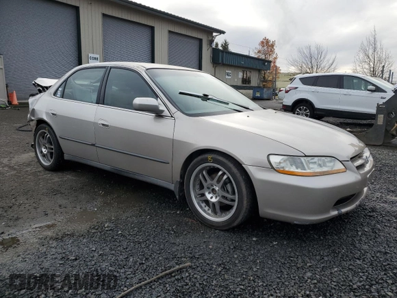1998 Honda Accord LX with VIN 1HGCG5540WA180862, listed as a Copart auction lot 87071084 with 394,803 mi miles and Salvage title. Bid and sale history available at DreamBid. Image 4.