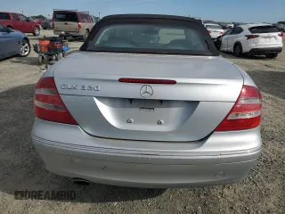 2005 Mercedes-Benz CLK 320 with VIN WDBTK65G65T052026, listed as a Copart auction lot 52526945 with 188,859 mi miles and Salvage Title. Bid and sale history available at DreamBid. Image 6.