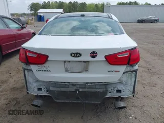 2015 Kia Optima EX z VIN 5XXGN4A71FG491012, wystawiony jako IAAI lot #41934936 z przebiegiem 151 312 mil mil oraz . Historia ofert i sprzedaży dostępna na DreamBid. Obrazek 17.
