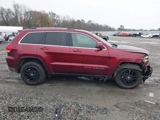2018 Jeep Grand Cherokee Laredo E with VIN 1C4RJEAG6JC304608, listed as a IAAI auction lot 41421010 with 178,708 mi miles and . Bid and sale history available at DreamBid. Image 13.