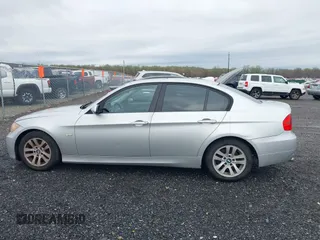 2007 BMW 3 Series 328i with VIN WBAVA33557PG53078, listed as a IAAI auction lot 41936187 with 186,492 mi miles. Bid and sale history available at carsss.com. Image 14.