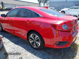 2016 Honda Civic EX-L z VIN 2HGFC1F79GH633213, wystawiony jako IAAI lot #42226171 z przebiegiem 107 023 mil mil oraz . Historia ofert i sprzedaży dostępna na DreamBid. Obrazek 3.