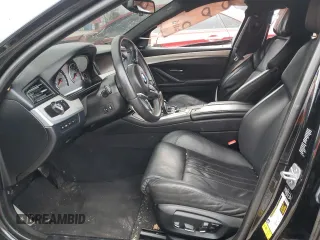 2014 BMW M5 z VIN WBSFV9C59ED097862, wystawiony jako Copart lot #85719684 z przebiegiem Nie podano mil oraz Szkody całkowita. Historia ofert i sprzedaży dostępna na DreamBid. Obrazek 7.