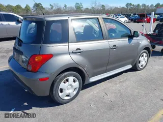2005 Scion xA with VIN JTKKT624250128078, listed as a IAAI auction lot 41651071 with 154624 miles. Bid and sale history available at carsss.com. Image 4.