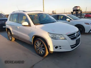 2010 Volkswagen Tiguan SEL with VIN WVGBV7AX4AW514362, listed as a IAAI auction lot 41413300 with 154,201 mi miles and . Bid and sale history available at DreamBid. Image 1.