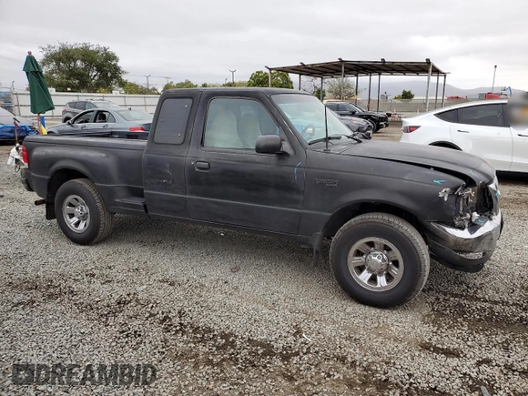 2000 Ford Ranger XL with VIN 1FTYR14V1YTA91858, listed as a Copart auction lot 54863035 with 244,120 mi miles and Salvage Title. Bid and sale history available at DreamBid. Image 4.