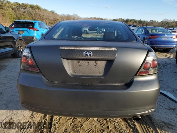 2005 Scion tC with VIN JTKDE177850037762, listed as a Copart auction lot 86132014 with 165,009 mi miles and Salvage Title. Bid and sale history available at carsss.com. Image 6.
