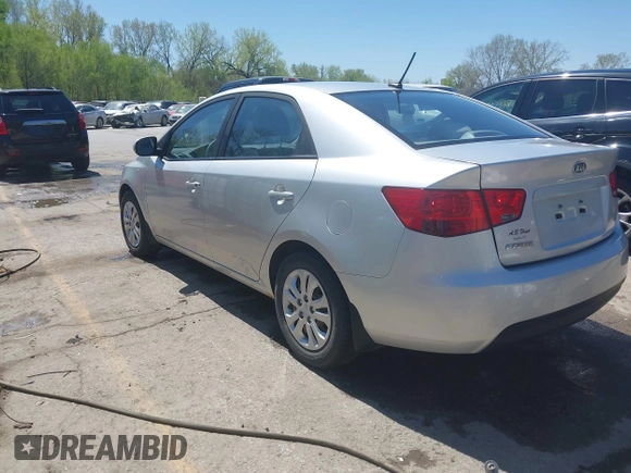 2010 Kia Forte LX with VIN KNAFT4A29A5061695, listed as a IAAI auction lot 42034559 with 114,470 mi miles. Bid and sale history available at carsss.com. Image 3.