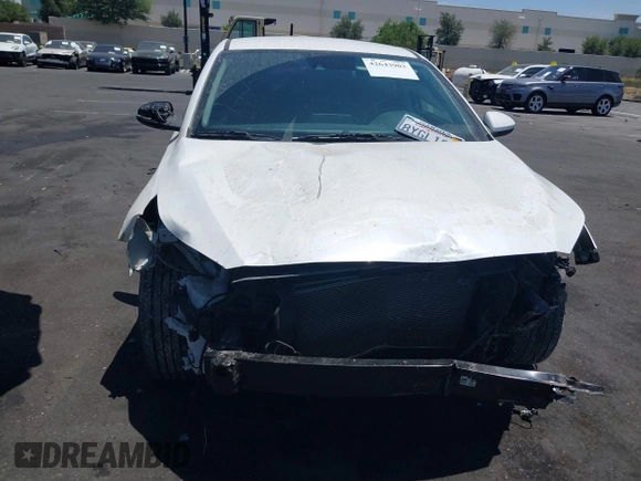 2021 Kia Forte LXS with VIN 3KPF24AD8ME403914, listed as a IAAI auction lot 42643903 with 34,305 mi miles and . Bid and sale history available at DreamBid. Image 6.