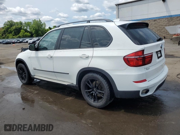 2012 BMW X5 35i with VIN 5UXZV4C54CL763857, listed as a Copart auction lot 57943195 with 143,522 mi miles and Salvage title. Bid and sale history available at DreamBid. Image 2.