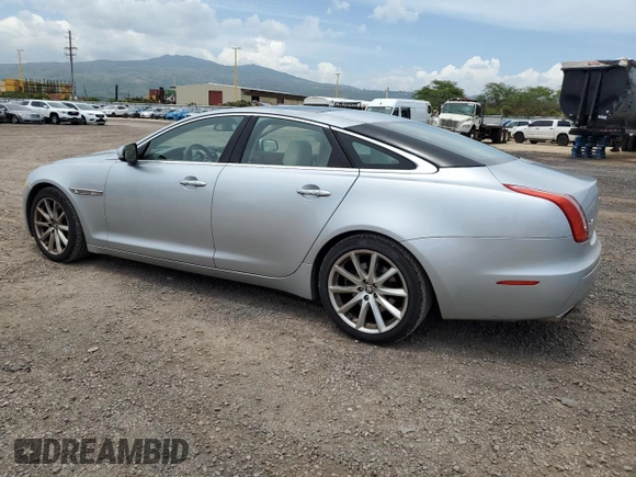 2011 Jaguar XJ with VIN SAJWA1CB9BLV05595, listed as a Copart auction lot 54947855 with 39,516 mi miles and Salvage title. Bid and sale history available at DreamBid. Image 2.