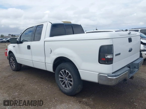 2004 Ford F-150 XLT with VIN 1FTRX12594KD71332, listed as a IAAI auction lot 42138488 with 170,234 mi miles. Bid and sale history available at carsss.com. Image 3.