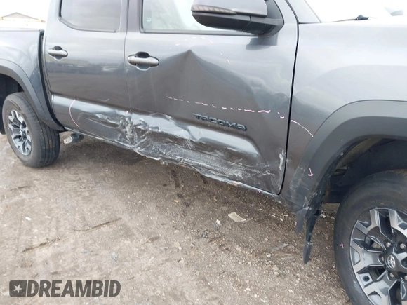 2021 Toyota Tacoma 4WD SR with VIN 3TMCZ5AN2MM406293, listed as a IAAI auction lot 41925585 with 52,243 mi miles. Bid and sale history available at carsss.com. Image 6.
