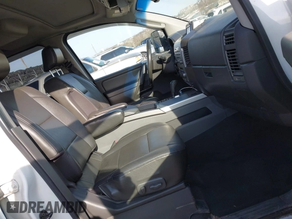 2007 Nissan Titan XE z VIN 1N6AA07B77N244215, wystawiony jako IAAI lot #41880030 z przebiegiem 138 405 mil mil oraz . Historia ofert i sprzedaży dostępna na DreamBid. Obrazek 5.