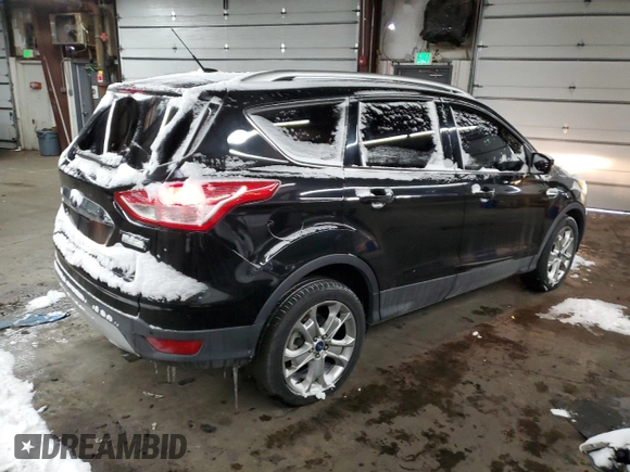 2015 Ford Escape Titanium with VIN 1FMCU0J91FUA41653, listed as a Copart auction lot 88871205 with 128,971 mi miles and Salvage Title. Bid and sale history available at DreamBid. Image 3.