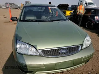 2007 Ford Focus S with VIN 1FAFP34N57W138756, listed as a Copart auction lot 54402375 with 260,127 mi miles and Salvage title. Bid and sale history available at DreamBid. Image 13.
