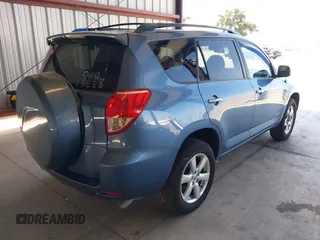 2007 Toyota RAV4 Limited with VIN JTMZK34V975011438, listed as a IAAI auction lot 42643034 with 163,616 mi miles and . Bid and sale history available at DreamBid. Image 4.