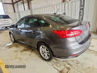 2018 Ford Focus SE with VIN 1FADP3FE0JL311760, listed as a Copart auction lot 63621755 with 81,000 mi miles and Salvage title. Bid and sale history available at DreamBid. Image 2.