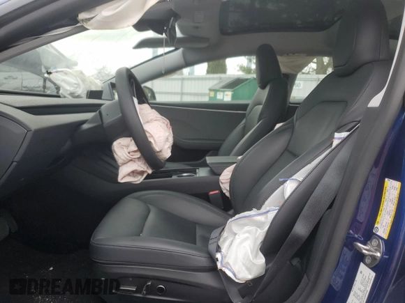 2024 Tesla Model 3 with VIN 5YJ3E1EAXRF829940, listed as a Copart auction lot 47689675 with 7,992 mi miles and Salvage Title. Bid and sale history available at carsss.com. Image 7.