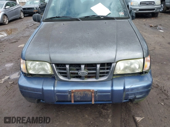 2001 Kia Sportage with VIN KNDJB723515095478, listed as a IAAI auction lot 41823976 with 185,652 mi miles. Bid and sale history available at carsss.com. Image 6.
