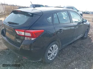 2017 Subaru Impreza with VIN 4S3GTAA60H3746716, listed as a IAAI auction lot 41846153 with 76,704 mi miles. Bid and sale history available at carsss.com. Image 4.