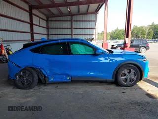 2022 Ford Mustang Mach-E Select with VIN 3FMTK1RM9NMA60359, listed as a IAAI auction lot 42633622 with 17,068 mi miles and . Bid and sale history available at DreamBid. Image 13.