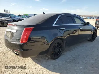 2014 Cadillac CTS Premium AWD с VIN 1G6AZ5S35E0159783, выставлен на аукционе Copart как лот 87081994 с пробегом 116 972 миль миль и Списание • Salvage title. История ставок и продаж доступна на DreamBid. Изображение 3.