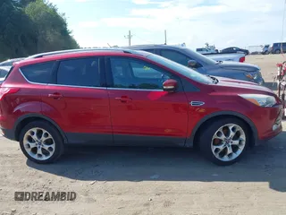 2016 Ford Escape Titanium с VIN 1FMCU9JX7GUA89405, выставлен на аукционе IAAI как лот 42631868 с пробегом 156 539 миль миль и . История ставок и продаж доступна на DreamBid. Изображение 13.