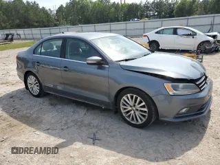 2015 Volkswagen Jetta SE z VIN 3VWD17AJ5FM309965, wystawiony jako Copart lot #54930665 z przebiegiem 141 918 mil mil oraz Szkoda całkowita • Salvage title. Historia ofert i sprzedaży dostępna na DreamBid. Obrazek 4.