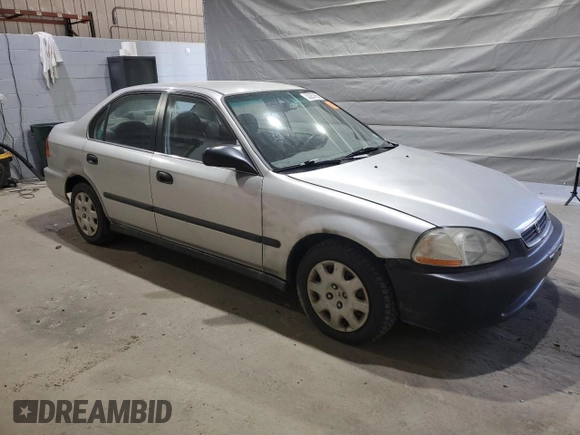 1998 Honda Civic LX with VIN 2HGEJ6675WH554442, listed as a Copart auction lot 53257865 with 104,597 mi miles and Clean Title. Bid and sale history available at DreamBid. Image 4.