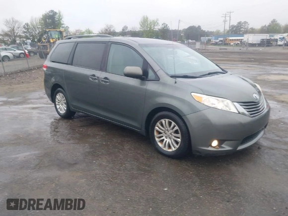 2013 Toyota Sienna XLE AAS with VIN 5TDYK3DC8DS401561, listed as a IAAI auction lot 41990044 with 214,111 mi miles and . Bid and sale history available at DreamBid. Image 1.