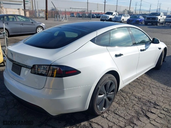 2022 Tesla Model S with VIN 5YJSA1E56NF493062, listed as a IAAI auction lot 41616427 with 41,874 mi miles. Bid and sale history available at carsss.com. Image 4.
