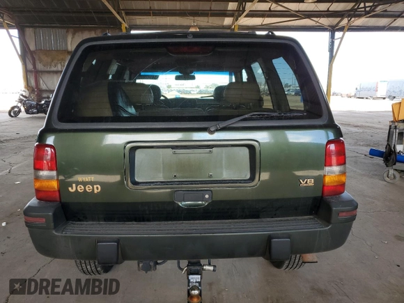1995 Jeep Grand Cherokee Limited with VIN 1J4GZ78Y2SC723898, listed as a Copart auction lot 54142035 with 173,454 mi miles and Salvage Title. Bid and sale history available at carsss.com. Image 6.