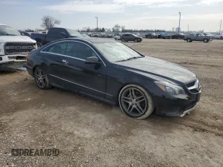 2015 Mercedes-Benz E 400 with VIN WDDKJ6FB6FF298535, listed as a Copart auction lot 44443655 with 64,305 mi miles and Salvage title. Bid and sale history available at DreamBid. Image 4.