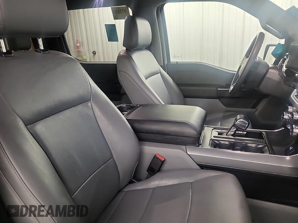 2023 Ford F-150 Lightning Pro z VIN 1FTVW1EL0PWG02840, wystawiony jako IAAI lot #42379448 z przebiegiem 52 710 mil mil oraz . Historia ofert i sprzedaży dostępna na DreamBid. Obrazek 15.