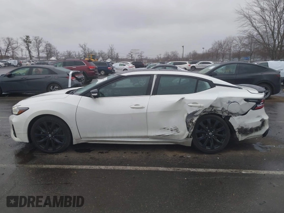 2020 Nissan Maxima SR with VIN 1N4AA6EV1LC373694, listed as a IAAI auction lot 41732550 with 80,453 mi miles and . Bid and sale history available at DreamBid. Image 14.
