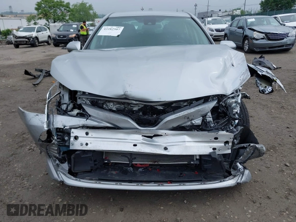 2019 Toyota Camry LE z VIN 4T1B11HK5KU813553, wystawiony jako IAAI lot #42282507 z przebiegiem 22 100 mil mil oraz . Historia ofert i sprzedaży dostępna na DreamBid. Obrazek 6.