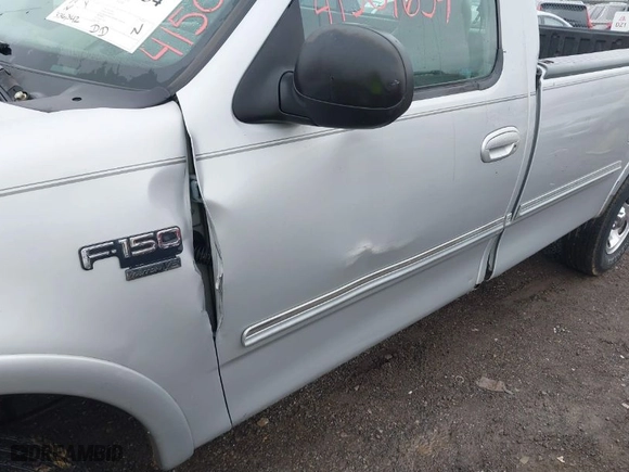 1998 Ford F-150 Standard with VIN 1FTZF18W2WNC27724, listed as a IAAI auction lot 41501654 with 336,342 mi miles. Bid and sale history available at carsss.com. Image 6.