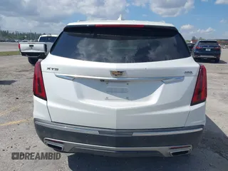 2020 Cadillac XT5 Premium Luxury FWD with VIN 1GYKNCRS7LZ129119, listed as a IAAI auction lot 41710878 with 52,575 mi miles and . Bid and sale history available at carsss.com. Image 16.