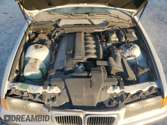 1998 BMW 3 Series z VIN WBABK8330WEY89818, wystawiony jako Copart lot #41557015 z przebiegiem 253 522 mil mil oraz Nie do naprawy • Non repairable. Historia ofert i sprzedaży dostępna na DreamBid. Obrazek 11.