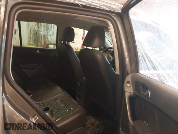 2012 Volkswagen Tiguan SE with VIN WVGBV7AX6CW093750, listed as a IAAI auction lot 42329775 with 117,509 mi miles and . Bid and sale history available at DreamBid. Image 8.