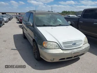2004 Kia Sedona LX with VIN KNDUP131546549302, listed as a IAAI auction lot 41819215 with 125,881 mi miles. Bid and sale history available at carsss.com. Image 1.